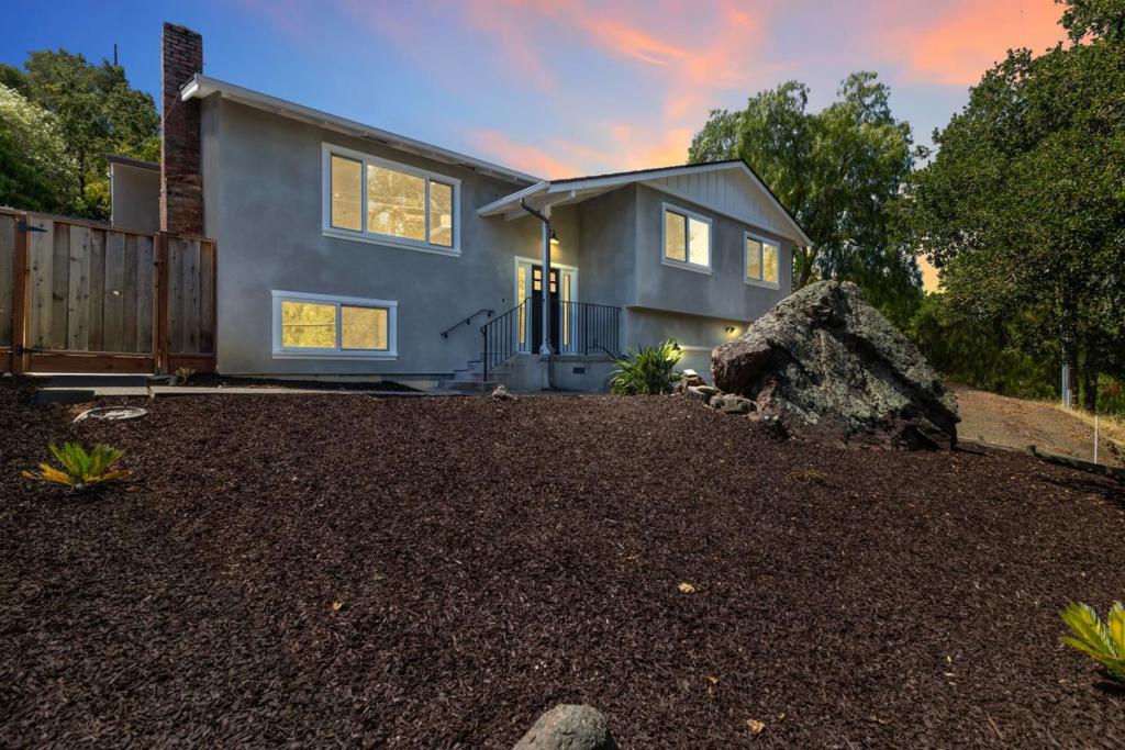Nestled in the serene Emerald Hills neighborhood, this beautifully remodeled single-family home offers a blend of luxury and comfort. The residence boasts 4 bedrooms and 2 baths across 1950 square feet of living space situated on a generous 9652 square foot lot. It is thoughtfully divided into two levels -the upper level is where you will find 3 bedrooms, while the lower level features a versatile space that can serve as a 4th bedroom, office, or playroom. Enjoy high-end finishes throughout, including hardwood floors, custom cabinetry, and custom tile work. The kitchen is equipped with high-end stainless steel appliances and a large island, perfect for culinary enthusiasts. This property includes double pane windows, upgraded electrical and plumbing systems and a brand new A/C and furnace for year round comfort. The expansive backyard features a private deck area and saltwater pool with thermal solar panels, ideal for relaxation and entertaining. The property also offers room for future expansion or an ADU & is located on a quiet cul-de-sac and offers peace and privacy complemented by stunning bay views. . Whether you envision a guest house, home office, or studio space, the possibilities are abundant - making this property as functional as it is beautiful.