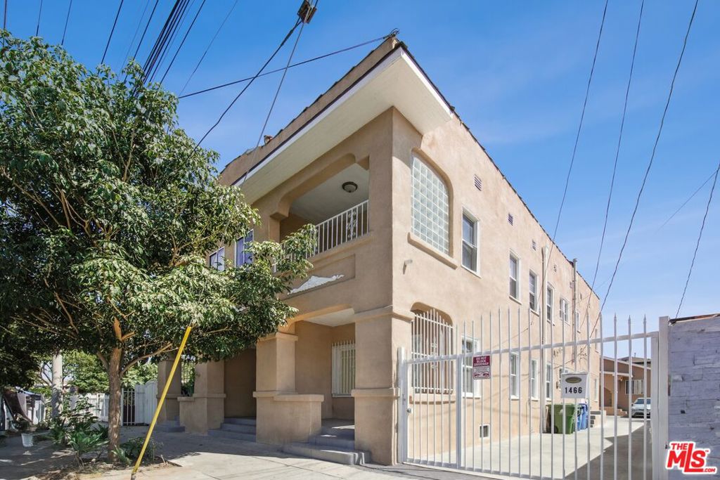 This centrally located 2 bedroom, 1 bathroom home offers the perfect blend of modern convenience and charming character. A covered porch entryway welcomes you into an inviting interior, unified by freshly painted white walls, tiled flooring, and an abundance of natural light. Two generously sized bedrooms, thoughtfully located at opposite ends of the apartment, provide optimal privacy. Nestled between the two bedrooms, you'll discover a bright and spacious kitchen and dining area with plenty of countertop space, built-in cabinetry, and an oven/range. A bathroom, located at the end of the elongated hallway, features a shower-over-tub combination, while a storage nook, at the other end of the hallway, offers a dedicated space for your additional or seasonal belongings. With proximity to the USC Campus and Exposition Park, this home brings the best of the city to your doorstep. Dine at top-rated neighborhood eateries like Holbox or Chichen Itza, spend a day at the nearby Natural History Museum, or experience a lively soccer game at BMO Stadium. With the Expo/Western Metro station nearby, explore all that Los Angeles has to offer in just moments. Masterfully balancing privacy and accessibility, this home places you in one of the most vibrant pockets of LA.