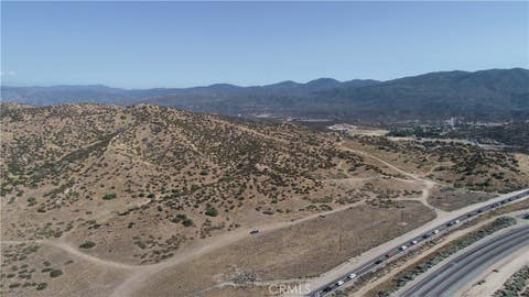 Photo of 0 Summit Valley Road, Oak Hills, CA 92345 (MLS # HD26176054)