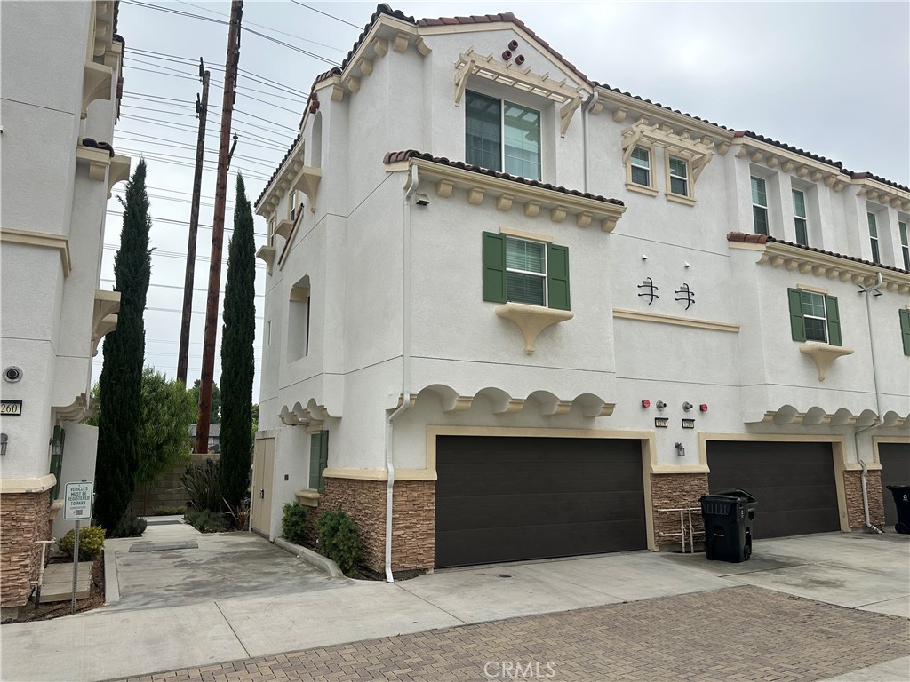 Modern Spanish-Style End Unit in Anaheim! Located in the newer Renato Villas community, this 3-story end unit offers 2 spacious bedrooms, each with a private bathroom. Enjoy open-concept living with 9-ft ceilings, recessed lighting, and a cozy fireplace. The stylish kitchen features a walk-in pantry, included appliances, and water softener. Highlights include a private balcony, in-unit laundry, central HVAC, tankless water heater, and 2-car garage with EV charger. Walk to school and enjoy quick access to Disneyland, Knott’s, and freeways. Move-in ready—don’t miss it!