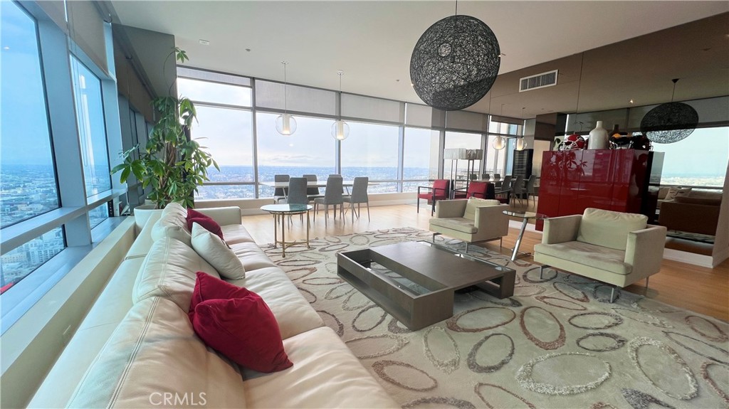 RITZ CARLTON RESIDENCE 5 STAR HOME. Most desirable corner unit 2 Bedrooms, 3 Bath premium level on the 44th floor Southeast Corner unit with spectacular view or Downtown, east and south side overlooking Crypto, LA Live and L.A Convention Ctr. Experience the ultimate lifestyle in the only 5 star hotel residence in Los Angeles. This spacious 1,880 square ft offers large living room with fantastic views with 8 floor to ceiling windows, huge master bedroom with full en-suite bath, second bedroom suite with marble shower & floor. Amenities include saltwater pool, screening room, Billiard, Conference room, Ritz Carlton spa, Room Service, Houseman and Valet Service.