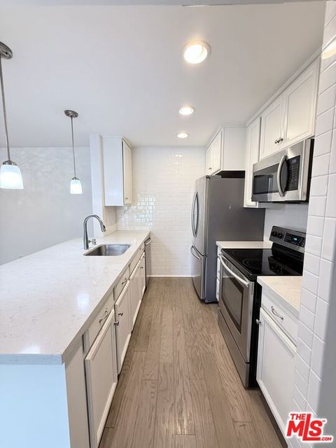 Photo of 5257 Radford Avenue #106, Valley Village, CA 91607 (MLS # 26670559)