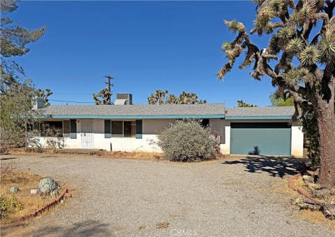 Photo of 7426 Elata AVE, Yucca Valley, CA 92284 (MLS # CV26151447)