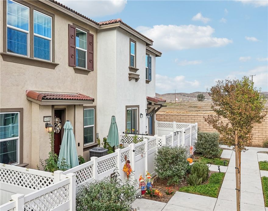 Like new 3 bed, 2.5 bath Townhome is ready to be made yours! Built in 2023, with Solar Panels, and FHA and VA Approved! Located in the desirable Sevilla community this home features a spacious and open floor plan with recessed lights, New beautiful wood plank LVP floors, and modern industrial look ceiling fans throughout the home. Low to no cost electric with the highly efficient solar power production.  The living room flows into the dining area with feature wall and gorgeous light fixture. The kitchen features granite counters, a center island with breakfast bar seating and white cabinetry with lots of storage space. A half bathroom and direct garage access complete the main floor. Upstairs you will find all 3 bedrooms including the large primary suite with private ensuite offering a soaking tub and separate shower. There is also a full-size hall bathroom for the 2 secondary bedrooms to share, and a laundry room with additional room for storage. This home has an attached 2-Car Garage and also features a private enclosed front patio. Residents also get to enjoy an array of Resort-Like amenities including a pool, spa, tennis court, basketball court, playgrounds, and grass areas. Conveniently located near schools, shopping, and dining options. Ready for its next chapter, this home is the perfect place to create lasting memories!