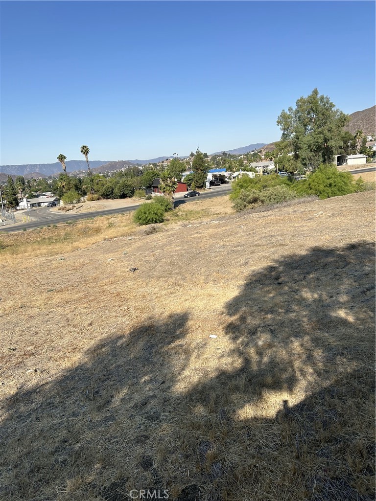 Commercial opportunity!!! Large .65 Acre Parcel next door to the new gas station, restaurant and across the street from the Muffler Shop and Mechanic service. Water and sewer available in street. Buyer and Buyer's agent to be responsible for investigating with the City of Menifee the development possibilities.
