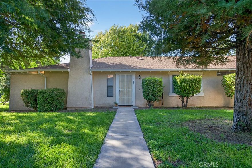 Enjoy golf course views and a prime location in Paso Robles Country Club Estates! Welcome to 128 Flag Way — a charming single-level, end-unit condo tucked beside the 6th hole of the Paso Robles Golf Club. This 2-bedroom, 2-bathroom home offers approximately 1,100 sq ft of comfortable living space and is filled with thoughtful touches including granite countertops in the kitchen and primary bath and brand new luxury vinyl plank in the living room, hallway and laundry! A cozy fireplace with an updates smooth finish surround and updated appliances and lighting add to the ambiance. Step into the spacious living room, perfect for relaxing or entertaining, and enjoy peaceful evenings on the covered back patio overlooking the greens. Located away from busy streets, with convenient parking right near the unit, this home offers a quiet and scenic setting with easy access to all the best of Paso Robles. The well-maintained homeowners association covers exterior upkeep, landscaping, and road maintenance, making everyday living easy. Close to schools, downtown, shopping, restaurants, and award-winning wineries, this home blends convenience, charm, and an unbeatable golf course setting. Schedule your private tour today — this one won’t last!