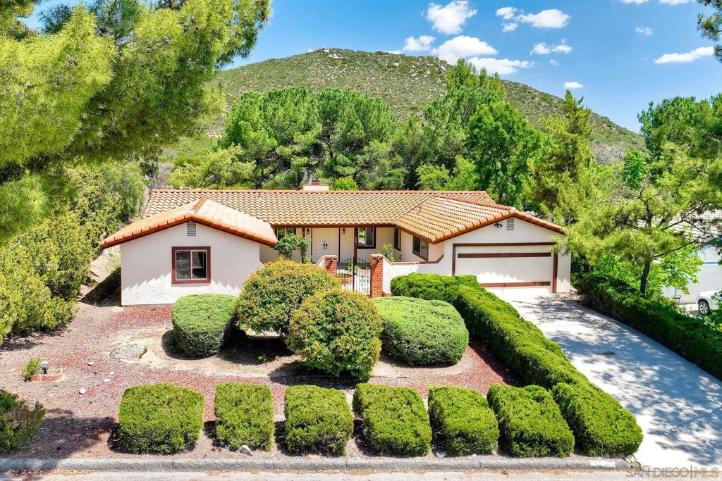 Range price $650,000–$700,000. Discover the potential of this spacious single-story home located in Ramona’s desirable San Diego Country Estates. This thoughtfully designed floor plan features generously sized rooms and a comfortable, natural flow throughout. A rear gate offers convenient access to and from the back of the property. Scenic Mt. Gower Open Space Preserve is a short distance up the street. Enjoy the SDCE lifestyle with amenities including miles of hiking trails, parks, community pools, golf, tennis, pickleball, and two dedicated dog parks. Horse lovers will appreciate the nearby equestrian centers and picturesque riding trails. Also close by: the San Vicente Resort Inn, a full-service spa, fitness center, and gourmet dining options.