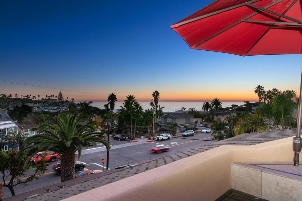 Ocean Views and West of the 101 - this Encinitas tri-level home offers the best in Southern California Coastal Living! This home offers not only a quintessential beach lifestyle but also an abundance of natural light streaming through the home, a kitchen with stainless steel appliances, new A/C and furnace, plantation shutters throughout, 2 cozy fireplaces, a back patio with a hot tub and bar area, multiple balconies and a rooftop deck with a fire pit to enjoy the sun setting over the Pacific! With all of the outdoor spaces it makes the home perfect for entertaining and being just a short walk or bike ride from all of San Diego's best beaches - this property is not to be missed!
