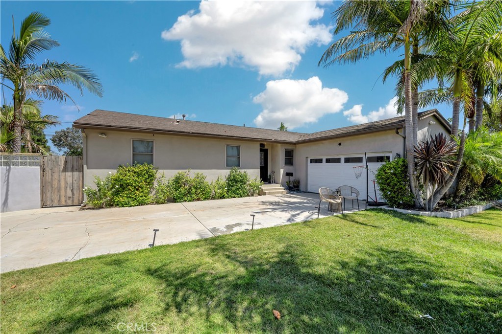 PRIME TUSTIN LOCATION – MINUTES FROM OLD TOWN & TUSTIN MARKETPLACE! This charming single-story 3-bedroom, 2-bathroom home offers the best of both convenience and comfort, ideally situated between the 5 and 55 freeways. Step inside to a bright and airy open-concept living space filled with natural light, enhanced by fresh neutral paint tones that create a warm and inviting atmosphere. The updated kitchen is designed for both style and function, featuring ample cabinetry and modern finishes that flow seamlessly into the dining and living areas—perfect for family gatherings and entertaining. All three bedrooms are generously sized, with the primary suite offering a private ensuite bathroom for added comfort. The secondary bedrooms provide flexibility for children’s rooms, a guest suite, or a home office. The true gem of this property is the expansive backyard, offering endless possibilities. Whether you envision a lush garden, a private outdoor retreat, RV parking area, or an ADU addition for rental income or multigenerational living, the potential is unmatched. A separate rear driveway already provides convenient access for a future ADU, making this home a rare opportunity for both homeowners and investors. Located just minutes from shopping, dining, entertainment, and top-rated schools, this property combines an unbeatable location with long-term value. Don’t miss your chance to own in one of Tustin’s most desirable neighborhoods!