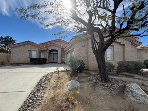 Photo of 74081 W Petunia Place, Palm Desert, CA 92211 (MLS # 219141721DA)