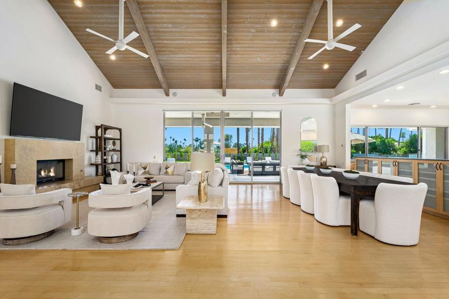 This exceptional estate is within the sought-after Clancy Lane of Rancho Mirage. The estate is situated on a sprawling parcel just over one acre, offering an unparalleled living experience defined by breathtaking panoramic vistas. The residence boasts four generously sized bedrooms and seven bathrooms, ensuring comfort and privacy for residents and guests alike. Discover the professionally designed interiors that showcase numerous custom upgrades, all harmoniously integrated to create an atmosphere of refined comfort, perfectly suited for both intimate family life and memorable large-scale entertaining. The grand entrance unfolds into expansive living and dining areas, designed to accommodate formal gatherings, including a dining area capable of seating ten. Adjacent is the chef-inspired kitchen, thoughtfully equipped with double islands, a double oven, a wine cooler, an ice maker, and two dishwashers. The gourmet chef's kitchen is a culinary haven featuring sleek granite countertops, top-of-the-line professional-grade appliances, and an abundance of space for culinary creativity. The primary suite serves as a private sanctuary, complete with a king-size bed, a tranquil reading nook, two walk-in closets, and a spa-like bathroom. This indulgent retreat features two separate bathrooms, a spacious walk-in shower, and a deep soaking tub. A well-appointed guest bedroom within the main house offers a comfortable queen bed, a dedicated desk area, a cozy sofa, a television, and convenient access to a private outdoor patio. Adding to the estate's versatility is a separate casita, ideally situated above the expansive three-car garage. This private guest quarters encompasses two well-appointed bedrooms: one featuring a king-size bed, a walk-in closet, a comfortable sofa, and a television; the second offering a queen-size bed and a television. The casita also includes a convenient kitchenette, providing independence and ease for visiting guests. Luxurious outdoor living features dining and seating areas with a fire pit, four poolside lounge chairs, a spacious lap pool and spa. A sweeping circular driveway offers ample parking for residents and guests. Discover the ultimate desert lifestyle in this exceptional estate. Situated in a prime, tranquil location, it offers convenient access to fine dining, golf, premier shopping, and Eisenhower Hospital. Enjoy year-round entertainment. The estate is available for a seasonal and/or annual lease.