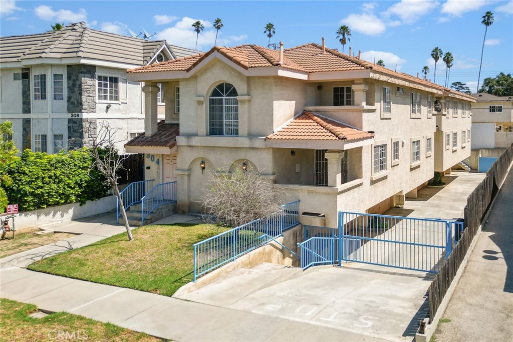 Welcome Home! This charming 3-bedroom, 2.5-bath townhouse sits in a quiet, gated 4-unit community in desirable North Alhambra. Offering 1,303 sq ft of living space, the home features high ceilings, LVP waterproof flooring, and a functional walk-through kitchen that opens to a downstairs bedroom with direct access to a private outdoor patio—perfect for relaxing or entertaining. Upstairs, you’ll find two spacious bedrooms, each with its own ensuite bathroom. One includes a private balcony, adding an extra touch of comfort and privacy. Additional highlights include in-unit laundry, central air and heat, a private side patio deck, and direct access to an oversized two-car garage. The community features guest parking spaces, a low HOA fee of only $250/month and close proximity to top-rated schools, shops, restaurants, and Downtown Alhambra, this move-in-ready townhouse offers exceptional value in the heart of Alhambra.