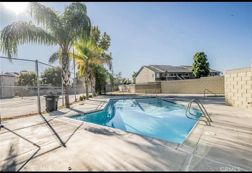Call agent for exciting financing options , low price for 1172 sq.ft. townhouse, very nice, clean and bright town house style, large living room with beautiful flooring and fireplace, central air condoning, high ceilings, patio, common pool, tennis court.