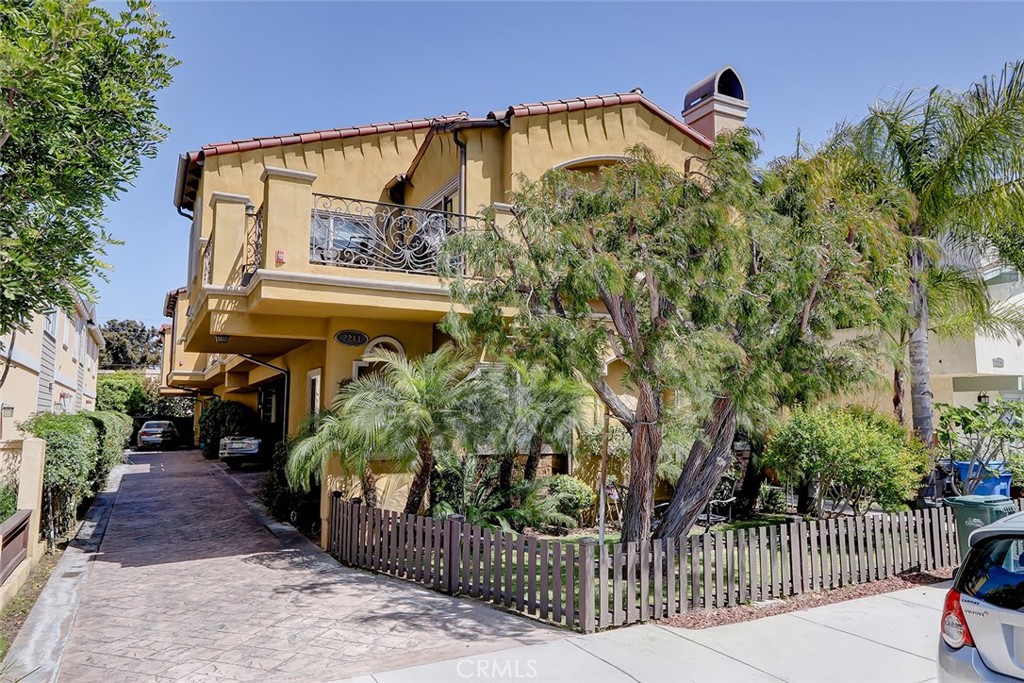 Welcome home to this pristinely maintained 2007 townhome in an excellent location in N.RB with the coveted 4 bedrooms & 2.5 baths. This light, bright, and open floor plan features a formal dining room that opens up to a spacious living area with vaulted ceilings, cozy fireplace, and secluded balcony perfect for entertaining and al fresco dining. The gourmet chef's kitchen is a cooks dream equipped with stainless steel appliances, granite countertops, and breakfast bar for casual dining. When the day's over, retreat to a spacious primary suite with a large walk-in closet and recently updated ensuite primary bathroom with dual sink countertops, soaking tub, and separate walk-in shower. Directly across from the primary is a guest bedroom which is perfect for a private office or nursery, and located on the main floor are the additional guest bedrooms along with laundry and full bathroom. The 2 car garage has direct access and ample storage space. Additional features include hardwood floors, recessed lighting and newer light fixtures, filtered water system, pre-wired surround sound, and more! This convenient location puts you in close distance to nearby award winning schools, bike path, and Artesia corridor w/shops & restaurants & also allows for quick access to fwys.