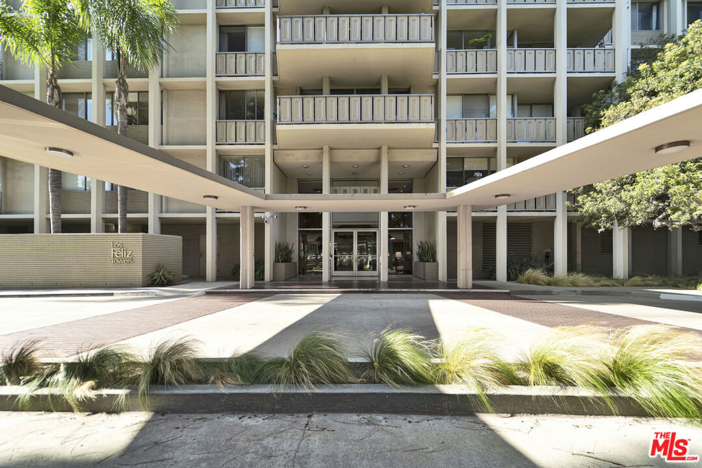 Refined and updated, this 2 bedroom, 1 bath corner unit is filled with natural light and framed by clean lines, floor-to-ceiling windows, and a calming neutral palette. A well-appointed modern kitchen and minimalist design create an atmosphere of quiet sophistication, while sweeping views from the expansive balcony bring the outdoors in. Set within the iconic Los Feliz Towers, mid-century modern landmarks rising above Los Feliz Boulevard, residents enjoy 24-hour security, a pool, gym, and beautifully landscaped grounds. Defined by their glass walls, open layouts, and sweeping views of the city, Griffith Park, and the Hollywood Hills, the Towers remain a lasting architectural statement of Los Angeles modernism. The location offers unmatched walkability, just moments from Griffith Park trails, the Observatory and the golf course as well as some of the city's best dining and cafes in Los Feliz Village. More than a home, this is a residence that blends timeless architecture with a vibrant neighborhood lifestyle.