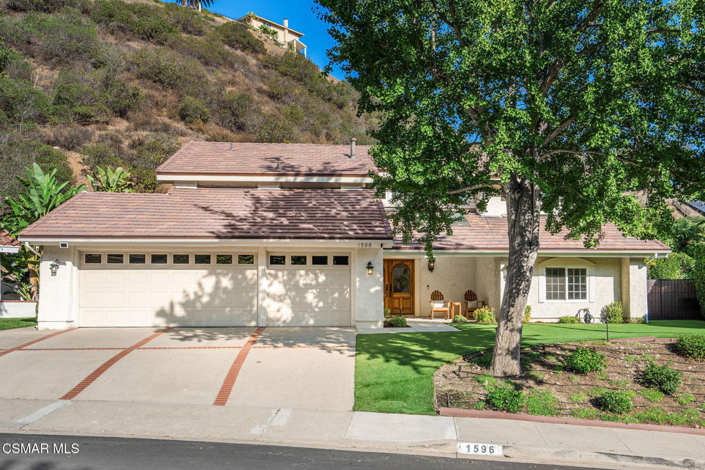 Nestled on a quiet cul-de-sac in the sought-after Ridgeview Estates neighborhood of Westlake Village, this beautifully updated 4-bedroom, 3-bathroom residence offers 2500 square feet of living space on an expansive 0.63-acre lot. Private, serene, and move-in ready, this home blends timeless design with modern touches for effortless everyday living.Step inside to light-filled, open-concept spaces featuring luxury vinyl floors, dual-paned windows, and a welcoming living and dining area anchored by a fireplace with striking Venetian plaster detail. The updated banister and staircase add a fresh, modern feel. A den with an adjacent remodeled full bath provides a flexible space for a home office, den or guest bedroom.The remodeled kitchen is the heart of the home, complete with center island, stainless steel appliances, beverage fridge, abundant cabinetry, and a sunny eat-in area with direct access to the outdoors. A spacious laundry room adds both style and function. Upstairs, the generous primary suite offers a bright retreat with ample closet space and updated ensuite bath. Two additional bedrooms share a connected, renovated bathroom.Designed for indoor-outdoor living, the backyard is a private oasis. Multiple seating areas, a sparkling pool, fire pit, built-in BBQ, and a recently refinished gazebo create the perfect setting for entertaining. Mature fruit trees--pomegranate, orange, lemon, and lime--enhance the charm of this incredible home. A set of stairs leads to a hilltop observation pad with gorgeous views, ideal for sunsets or quiet reflection.Additional highlights include a new concrete tile roof, newer HVAC ducting, new water heater, and impeccable curb appeal with turf landscaping, a charming front porch, and beautifully maintained grounds.Located within the sought after Conejo Valley Unified School District--Westlake Elementary, Colina Middle School, and Westlake High School--this home offers an unbeatable combination of modern updates, timeless charm, and the lifestyle Westlake Village is known for. Just moments from vibrant dining, shopping, grocery stores, the Sunday farmers market, and the Westlake lake, this residence truly captures the best of Westlake Village living.