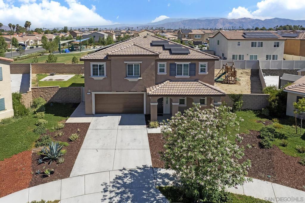 This stunning 5-bedroom, 5-bathroom home, built in 2022, offers the perfect blend of modern design, comfort, and energy efficiency. Boasting over 2,400 square feet of beautifully designed living space, this home is ideal for families of all sizes or those who love to entertain. Located at the end of a quiet cul-de-sac, the property offers extra privacy and safety, with minimal through traffic—ideal for children at play or peaceful evenings outdoors. Inside, you’ll find an open-concept layout with abundant natural light, a spacious gourmet kitchen with upgraded appliances, and multiple living areas that allow for both relaxation and functionality. Each of the five bedrooms is generously sized, and all five bathrooms are tastefully appointed with modern finishes. This home is equipped with a solar system to help keep energy costs down and reduce your environmental footprint, as well as a soft water system for added comfort and convenience throughout. Additional highlights: • Low HOA fees • NO Mello-Roos taxes • Attached garage with ample storage • Professionally landscaped front and backyard • Turnkey and move-in ready This rare find offers modern luxury, smart efficiency, and unbeatable location—all in a desirable neighborhood with limited extra fees. A MUST SEE!