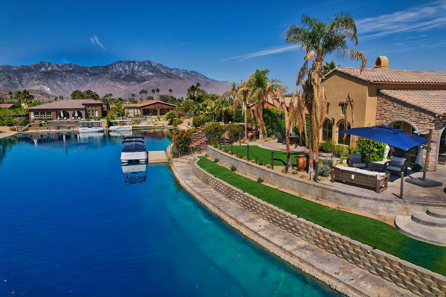 ( *Summer rate through end of October $7500mo* ) (*Booked JAN FEB MARCH 2026* ) Seasonal vacation rental. This home has an exceptional waterfront view on the lake in the highly desirable gated community of Santo Tomas community in Rancho Mirage California. 4 bedrooms and 4 bathrooms. Attached casita. Infiniti pool with grotto, waterfall & spa. BBQ. Fire pit. Owners include social membership to Mission Hills Country Club which allows access to world-class fitness, tennis and social activities. HOA fees, landscape maintenance, pool & spa maintenance + trash service are included. Tesla charging station in 2 car garage. This home is on the largest lot in the community and is located on a cul de sac. Owners include HOA fees, pool & landscape maintenance. $9000mo annual tenants pay utilities and screening fee. $15,000mo Seasonal Vacation bookings include utilities up to $300mo and wireless Internet. 1 closet in primary bedroom suite will be locked off for owners closet with seasonal rental bookings. Contact agent for more information.