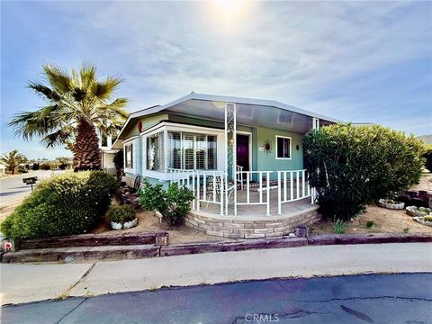 Photo of 7501 Palm Ave #100, Yucca Valley, CA 92284 (MLS # JT26065655)