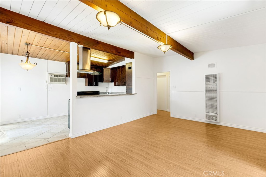 The unit features two bedrooms, one bathroom, and a private patio/balcony. Interior includes laminate flooring, vaulted ceilings, ceramic tile finishes, and a fully updated kitchen with granite countertops, a dishwasher, and a modern island stove hood. Dual-pane windows and a sliding glass door provide enhanced energy efficiency and noise reduction.
Located in Glendale’s prestigious Verdugo Woodlands neighborhood, this second-floor unit offers approximately 800 square feet of comfortable and thoughtfully designed living space. Just north of Glendale Community College and nestled in an elite residential area with access to top-rated schools, this apartment combines location, convenience, and style.
Residents benefit from one covered parking space with a private storage bin, ample street parking, and access to a shared laundry facility with designated cubbies for each unit. The property also offers a communal open area with a small fire pit, creating a warm and inviting outdoor space for residents to enjoy.
This is a rare opportunity to live in one of Glendale’s most desirable communities—schedule your showing today.