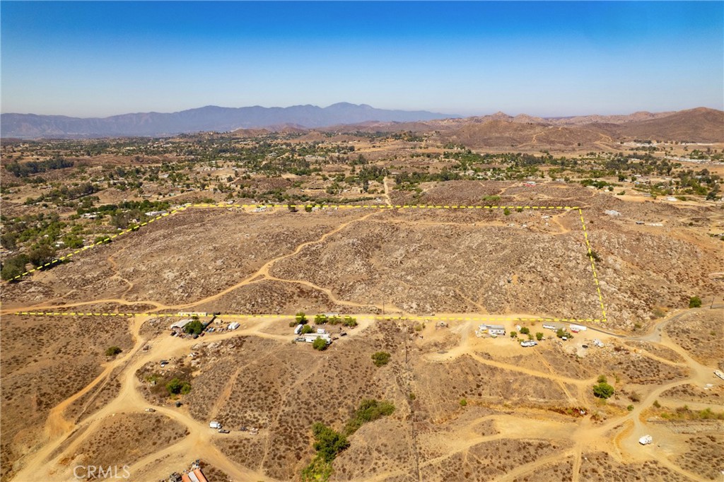 Beautiful 70 Acre Parcel in the community dev part of the General Plan of Riverside County, could be annexed to Elsinore. This huge parcel is located right off fast developing Highway 74 between the 15 and 215, but closer to Lake Elsinore. This beautiful land is on the back side of Canyon Lake, almost adjacent to BLM Nature Preserve land with forever open beautiful views yet 10 minutes to down town Lake Elsinore or Perris! This land is priced LOW per acre for a quick sale. Some top rocks scattered along some of the acreage but it is beautiful and good for privacy yet most are easily moved. Quarry companies have asked for permission to get some. Endless possibilities for a business, family compound, spec home estates, or just to buy and hold for a great investment! A main sewer line has been put in at Hwy 74 and Richard!