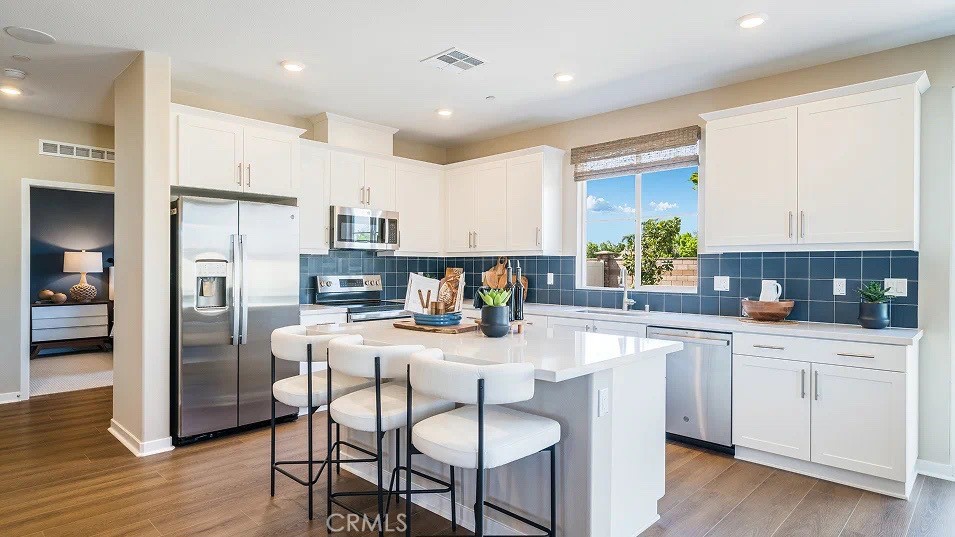 NEW CONSTRUCTION! This new two-story home is ready for modern lifestyles. On the first floor, the kitchen, living and dining areas share an inviting open-concept layout, with a secluded bedroom tucked away at the back of the home. On the second floor, a versatile study provides a convenient shared living space easily accessible from two bedroom and a luxurious owner’s suite, complete with a full bathroom and dual walk-in closets.
Armonia is a new series offering brand-new single family homes for sale now selling in the Legado masterplan in Menifee, CA. The community offers an amenity-rich lifestyle with access to a modern clubhouse, sport courts, multiuse trails and much more. Nature lovers will enjoy ample outdoor recreation on nearby Lake Menifee and at Menifee Lakes Park or Paloma Valley Park. The Promenade at Menifee Valley is a local shopping center with an array of shopping, dining and entertainment options.