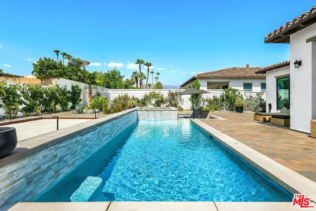 AVAILABLE FROM OCT 2025. NEW Rent prices: OCT $7,500 | DEC $12,000 | JAN $13,000** UNAVAILABLE FEB- APRIL 2026. Welcome to Villa Chic, your luxurious retreat nestled in the heart of Indian Wells. This brand-new, chic modern Mediterranean home offers the epitome of sophisticated living with its impeccable design and lavish amenities. As you step inside this stunning villa, you are greeted by the spacious and elegant living area adorned with designer furnishings and captivating artwork. Sink into the plush seating and unwind in front of the 80-inch TV, perfect for cozy movie nights or catching up on your favorite shows. The villa boasts three luxurious bedrooms, each offering its own private sanctuary for relaxation. With five exquisite bathrooms, including master ensuites, every guest will experience the utmost comfort and convenience during their stay. Indulge in outdoor living at its finest with the expansive pool area featuring a refreshing Baja shelf and a tranquil waterfall spa. Challenge your friends and family to a friendly game of Bocce ball on the private court, or simply soak up the California sunshine while lounging on the stylish poolside furniture. Entertain in style in the chef's kitchen, complete with a large island and bar seating, sure to wow your guests. Whip up culinary delights with top-of-the-line appliances and ample counter space, then gather around the impressive island for casual dining and conversation. Step outside to the spacious loggia, complete with al fresco dining and a cozy conversation area. Fire up the built-in BBQ and savor delicious grilled meals while admiring the breathtaking mountain views that surround the property. For those looking to explore the area, take advantage of the complimentary golf cart and bikes provided for your convenience. Discover all that Indian Wells has to offer, from world-class golf courses to upscale dining and shopping destinations. Experience the height of luxury and sophistication at Villa Chic, where every detail has been meticulously crafted to ensure an unforgettable stay in paradise. Book your getaway today and indulge in the ultimate desert retreat. AVAILABLE FROM OCT 2025. Rent prices: OCT-NOV $10,500. | DEC $14,000 | JAN-APR $15,500