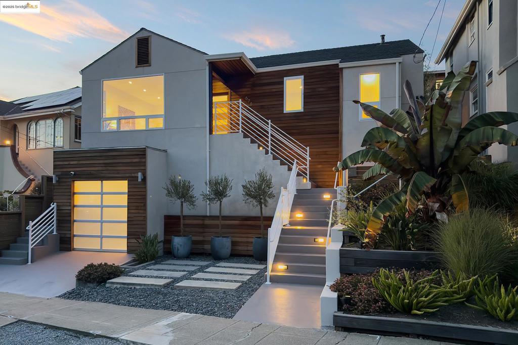 Welcome to this stunning Crocker Contemporary, which seamlessly blends high-end design with everyday comfort. With three bedrooms on the main level and the primary suite upstairs, the floor plan is ideal for family living. The beautiful chef's kitchen is outfitted with an elite Thermador appliance package, including a six-burner range, a built-in refrigerator, and a generous center island ideal for quick meals or gathering with friends and family, where culinary creativity will be encouraged. The open concept family room connects effortlessly to the beautiful teak deck for indoor-outdoor living at its best. The primary suite is a true sanctuary, complete with a walk-in closet and level-out access to the upper deck, level lawn, and beautifully landscaped garden. Each light-filled bathroom incorporates luminous glass tile and designer fixtures for a sleek, modern touch. Located just minutes from the lively Lakeshore shopping district, enjoy easy access to Philz Coffee, Arizmendi Bakery, Trader Joe's, the vibrant Saturday Farmers' Market, and more. This home delivers style, substance, and a prime Crocker Highlands location, a top-rated public Elementary School, all of which make it an ideal choice for your next home!