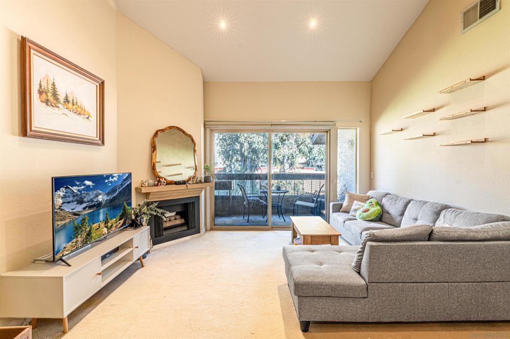 Welcome to this stunning top-floor condo located in the heart of Mission Valley. The vaulted ceilings, recessed lighting and an abundance of natural light provide a spacious feel. Enjoy your coffee in the mornings on the private balcony and relax in the evenings next to the cozy fireplace. The kitchen features stainless steel appliances, including a wine fridge, granite countertops and ample storage. In the complex you'll enjoy resort-style amenities, including a pool, fitness center, outdoor grills, picnic areas and a clubhouse for gatherings. Conveniently located near shopping, dining and entertainment, this condo offers a perfect blend of sophistication and lifestyle. Don't miss out on this incredible opportunity!