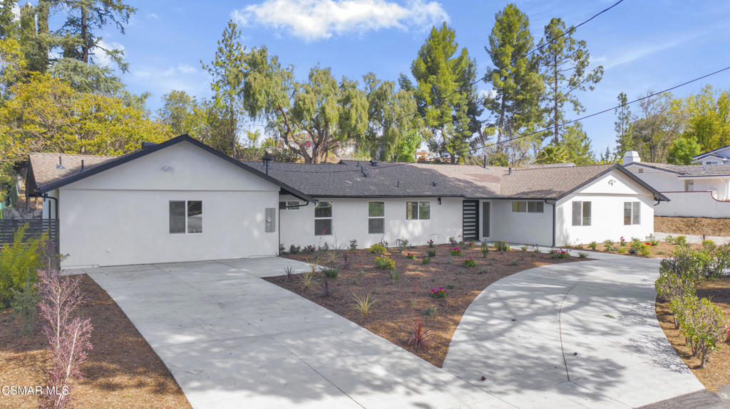 : Discover this beautifully renovated 4-bedroom, 3-bathroom home with a 1+1 ADU, located in the highly sought-after Thousand Oaks School District. Spanning approximately 2,400 square feet of living space, this stunning residence sits on an expansive 24,000-square-foot lot, offering the perfect balance of privacy and convenience. As you step inside, you'll be greeted by spacious, light-filled living areas that provide an inviting atmosphere, perfect for both everyday living and entertaining. The modern kitchen is a chef's dream, boasting sleek finishes, high-end appliances, and plenty of counter space for meal prep and hosting. The open floor plan effortlessly connects the kitchen to the living and dining areas, making it ideal for family gatherings and entertaining guests. The luxurious primary suite offers a peaceful retreat with ample closet space and a spa-like en-suite bathroom, featuring a modern vanity, soaking tub, and separate shower. The additional bedrooms are generously sized, providing comfort and privacy for the entire family. The entire home has been meticulously upgraded with no detail overlooked. Electrical updates include rewiring the entire house and ADU, with new outlets, light switches, dimmer switches, recessed lighting, and a new 200AMP main electrical panel, along with a new sub-panel for the ADU. Plumbing has been completely repiped, including all water lines, drain lines, vent lines, and gas lines for both the house and ADU. To enhance energy efficiency, all new insulation has been installed in the house attic and ADU roof. The home also boasts all-new double-pane windows and sliding doors throughout, ensuring added comfort and energy savings. Each of the bathrooms has been fully renovated with new tiles, valves, vanities, toilets, and shower glass doors, creating a modern and luxurious experience. The exterior has been refreshed with smooth new stucco on both the house and the ADU, giving the property a sleek, updated look. For outdoor enthusiasts, the pool area has been fully updated with new repiping, plaster, tile, a new heater, smart remote system, and pump. A new HVAC system has been installed for the house, while the ADU enjoys a new split A/C system for optimal comfort. The property also features new landscaping, including a modern drip irrigation system for easy maintenance. It's important to note that all work was completed with city-pulled permits, passed city inspections, and was finalized by the city inspector. This ensures the property has been upgraded to the highest standards and is ready for its new owner to move in and enjoy. Outdoor living is equally impressive with a sparkling pool, hot tub, and expansive patio area, making it the perfect space to unwind, host gatherings, or enjoy a quiet evening under the stars. The large lot also offers RV parking, ensuring convenience for those with recreational vehicles or extra storage needs. A standout feature of this property is the attached ADU (Accessory Dwelling Unit), complete with 1 bedroom and 1 bathroom. Whether you're hosting family or friends, seeking a private home office, or exploring rental income potential, this flexible space offers endless possibilities. Located in a prime area close to local amenities, shopping, and dining, this home truly offers the perfect combination of luxury, comfort, and practicality. Don't miss the chance to make this exceptional property yours - it's an opportunity you won't want to pass up!