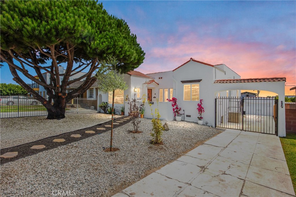 Step into timeless Spanish architecture reimagined for modern living. This fully transformed 1926 residence offers 3 bedrooms, 2 baths, and 1,319 sq ft of thoughtfully designed living space plus a 400 sq ft detached bonus room, ideal for a guest suite, home office, or creative studio.
Major upgrades were completed in 2024 and 2025, including a full plumbing repipe, electrical rewiring with 200 amp panel, roof replacement in 2024, recently installed HVAC, tankless water heater, insulation, drywall, and energy efficient windows.
Designer finishes elevate every space: a Batchelder style Claycraft fireplace, Moroccan unlacquered brass fixtures, Zellige tile by Bedrosians, engineered hardwood flooring, custom shower glass, marble counters, and Forno appliances with a pot filler for the chef’s kitchen.
Outdoors, enjoy a private fenced yard with landscaping and irrigation, a dedicated 50 amp outlet for EV charging, plumbing already run for a gas fire pit (connection needed), and smart home features including Ring cameras and smart thermostat.
Located on a quiet tree lined street in highly coveted View Park, this home blends historic character with the comfort of a recent, top to bottom renovation. The detached bonus room provides unmatched flexibility, whether as a guest space, gym, or work from home retreat.