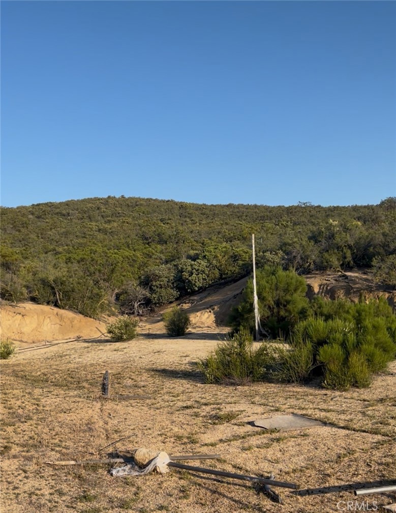Private 5.28-Acre Lot with Utilities – Anza, CA
Tucked away at the end of a quiet road, this serene 5.28-acre property offers the perfect blend of privacy and convenience. Located just minutes from the main road in Anza, this fully fenced lot features electricity and water already on site—saving you time and investment when you're ready to build.
Nearly all of the land is usable, providing ample space for a custom home, agriculture, animals, or recreational use. Mature trees dot the landscape, offering shade and natural beauty, while the peaceful surroundings make it an ideal retreat from city life.
Whether you're dreaming of a weekend getaway, a ranch-style homestead, or future development, this property is a rare opportunity in a growing rural community.