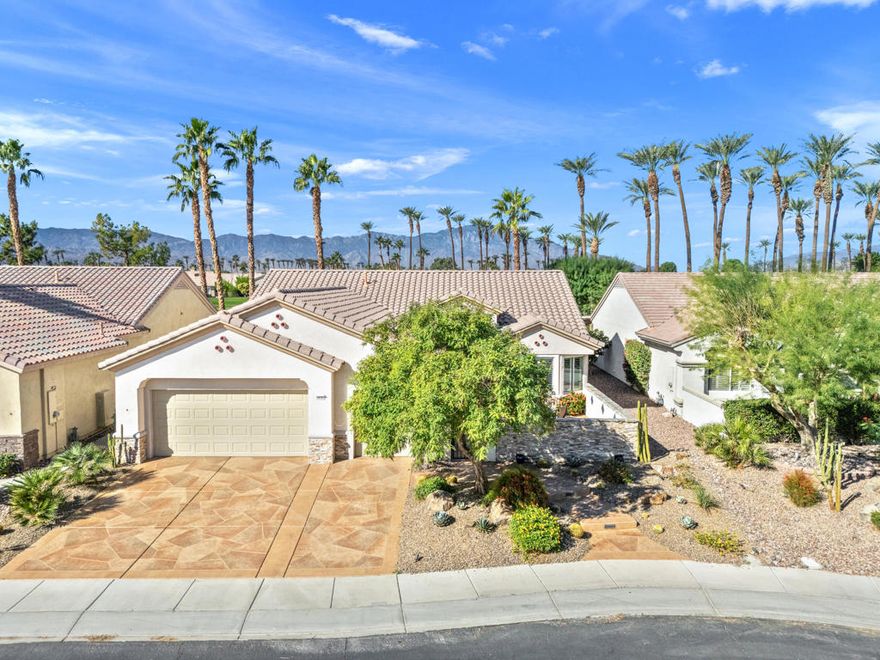 55+ Sun City Palm Desert--The ''Best BANG for your BUCK'' active retirement community in the whole Coachella Valley and beyond. Most popular St. Croix model with 2 beds/2 full baths, plus a DEN/HOBBY/FLEX room and golf cart garage. Spectacular golf course, sunset, mountain and lake views!!! GREAT location in the newer section of Sun City close to the Lake View Recreation Center. Stunning curb appeal features added courtyard patio wall for extra privacy with stacked stone, custom concrete overlay, desert landscaping with updated irrigation system, and courtyard and landscape lighting. Inside, NEWER AC in 2021, tile and plantation shutters throughout, new paint, new recessed lighting, all new ceiling air vents, Culligan water softener and reverse osmosis system. Kitchen features granite slab, quartz backsplash, pendant lighting over breakfast bar, refaced cabinets with hardware, upgraded stainless appliances and gas cooktop. The living room has a beautiful custom media center with touch lighting, the dining room has a brand new window, sliding door to the  rear patio. The master bedroom is spacious, has a bay window with a window seat with a view, bathroom has double vanity, and closet system. Guest bedroom has fan/light, bath in hallway with a tub/shower combo. The famous DEN/HOBBY room is perfect for a TV room, office, workout room, and an extra guest space. The laundry room is inside, has cabinets and sink, washer and dryer are included (approx. 4 years old) Garage is extended, has epoxy flooring, new door opener, electric car charger, extra fridge and mini-split AC. NOW for the BEST PART!! Double fairway VIEWS of the golf course in both directions! Extended concrete patio with custom overlay, sparkling  custom waterfall with stacked stone and new pump, French drainage system, added irrigation, landscape lighting. Perfect for relaxing and/or entertaining with family and friends for the holidays! ''Buy Where you Love to Play...Sun City Palm Desert!''