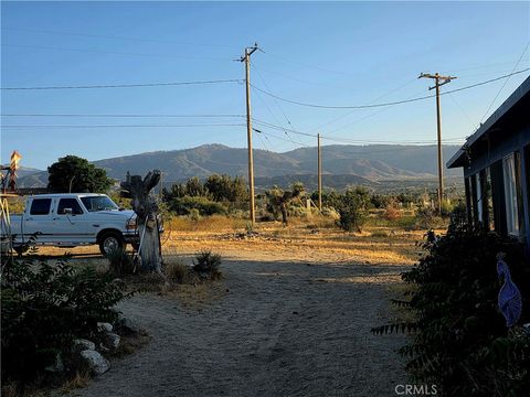 Photo of 10623 Desert View RD, Pinon Hills, CA 92372 (MLS # HD26112293)