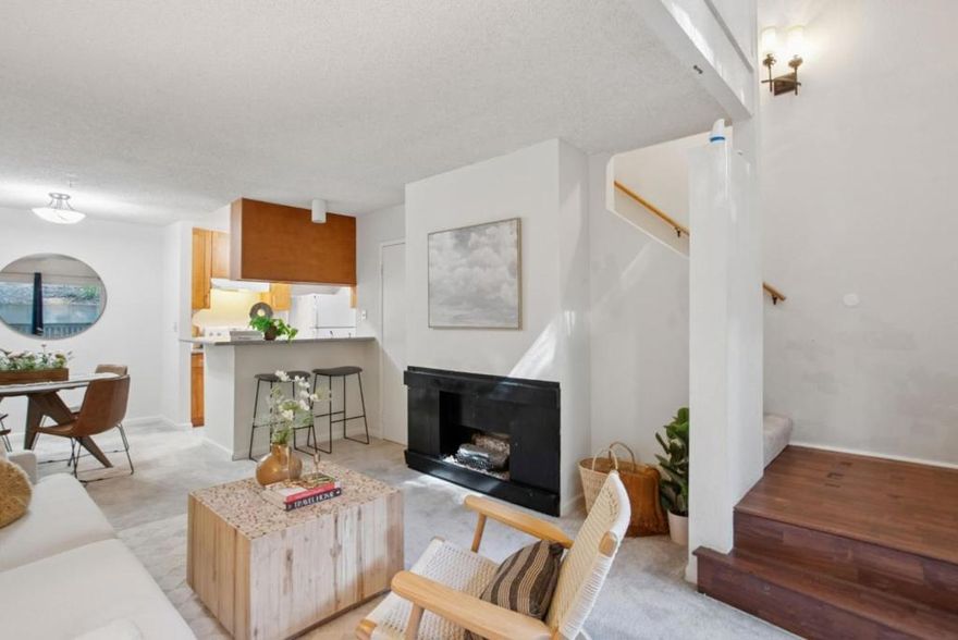 Experience townhouse-style living in this charming 1-bedroom, 1-bathroom condo with its own private entrance and direct unit access. The open-concept layout features a cozy fireplace, in-unit laundry, and a serene outdoor patio perfect for relaxing or entertaining. Quiet and private, this home offers a peaceful retreat in the heart of Daly City. Included is one deeded parking space and access to Crown Colonys resort-style amenities including 24/7 gated security, a fully equipped fitness center, swimming pools, hot tub, sauna, tennis courts, and a clubhouse. The HOA covers water, garbage, building insurance, and exterior maintenance for added peace of mind. Ideally located just minutes from BART, major freeways, shopping, and dining, this property combines comfort, convenience, and value an excellent opportunity for first-time buyers, downsizers, or savvy investors.......