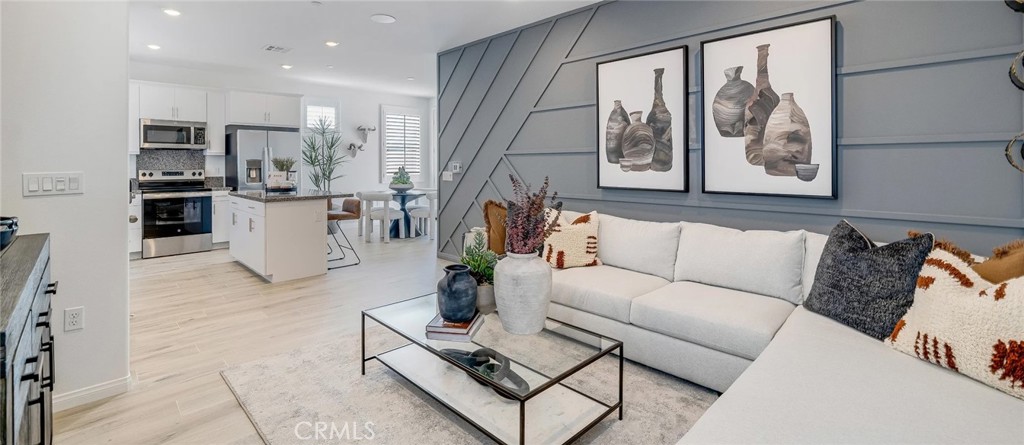NEW CONSTRUCTION! This new two-story home provides a modern and inviting layout. The first floor features an open-concept floorplan shared between the kitchen, dining room and Great Room. All three bedrooms are located on the second floor, including the luxe owner’s suite with a full bathroom, surrounding a versatile loft. A two-bay garage completes the home.
Tailwind is a new collection of single-family homes at the Renaissance masterplan, now selling in Rialto, CA. This gated community offers fantastic onsite amenities, including a relaxing swimming pool, playground, dog park, tot lot and much more. Homeowners will be a short drive from shopping, dining and entertainment at the Renaissance Marketplace. Renaissance boasts a prime location near the I-210 and I-15 freeways, providing easy commutes to Los Angeles, San Bernardino and other surrounding areas. The community is conveniently located near top universities such as California State University, San Bernardino (CSUSB) and the University of California, Riverside (UCR), offering excellent opportunities for higher education.