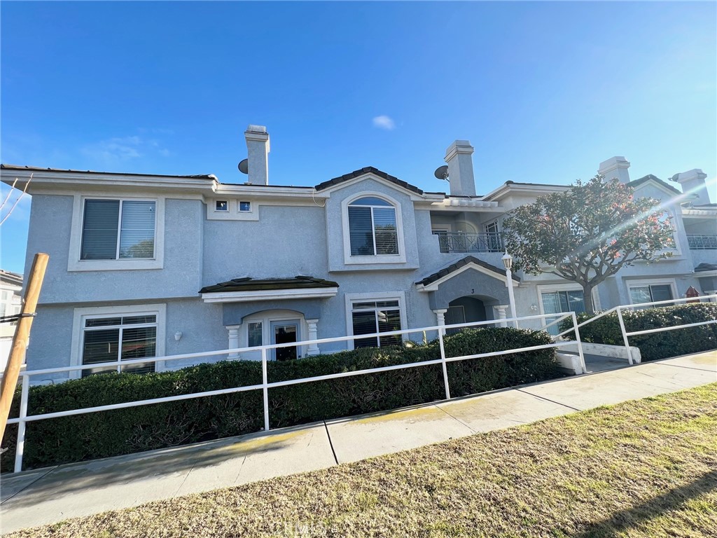 A Beautiful Townhome in Laing's First Edition Community. This rental unit features 3 bedrooms and 2.5 bathrooms with 2-car garage direct access to the unit. Entering the home, you will find a sweet warm living room that leads you to a family room with a fireplace. A nice kitchen with plenty of cabinets and an individual laundry room that leads to garage. Newer laminate flooring downstairs and carpets upstairs. New paint and new ceiling dimmable recess light throughout the entire unit. Downstairs you have a private yard in the front and upstairs you have a balcony outside the master bedroom. Community features dog parks and pool. Plenty of parking inside the community and on the street. A big park next to the community with a short walking distance. All kinds of shops and restaurants around the area, such as Costco, Home Depot, Walmart, McDonalds...almost everything you can name it. Come find out more and do not miss the opportunity!!!