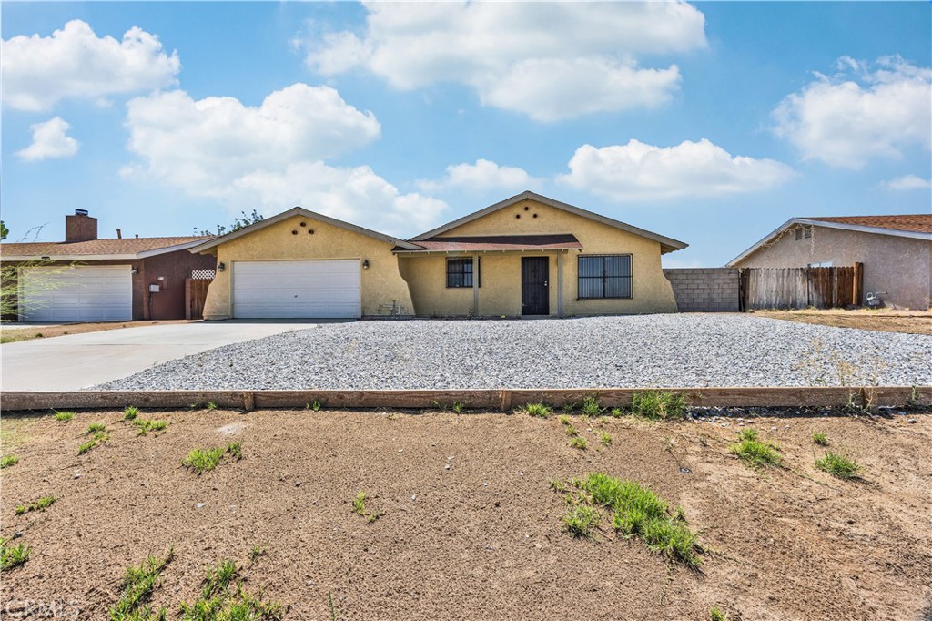 Welcome to 10416 Stage Coach Drive in Adelanto. This home features an open layout with plenty of natural light and a comfortable flow from the living room with its cozy fireplace to the dining area and kitchen. The spacious lot provides a large backyard with a covered patio and storage shed, perfect for entertaining, relaxing, or future projects. An attached 2-car garage and ample driveway space add everyday convenience. Located near schools, shopping, parks, and easy access to US-395, this property offers both comfort and potential in a growing community.