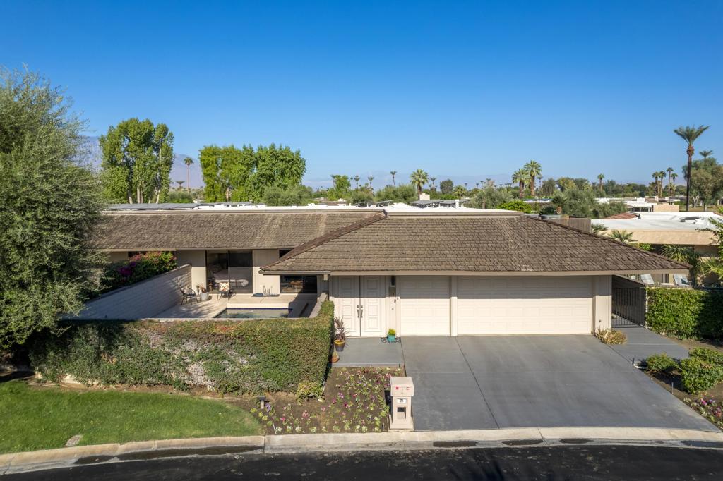 ***Unfurnished Long-Term Lease Only***Updated Pebble Beach home at The Springs Country Club. Enter through double wood doors into a courtyard with a private pool that has fantastic mountain views. Double front glass doors lead to a wide foyer and into this 3 bedroom plus den with 4 bathrooms - all bedrooms are en-suite. Mountain views from living, dining and primary bedroom with peek-a-boo golf course vistas, too. Modernized galley kitchen with stainless steel appliances including gas cooktop. Owned solar - 24 panels - installed in 2020. Newer mechanicals. The Springs is a guard-gated community located across from Eisenhower Medical Campus and super convenient access to everything the desert lifestyle has to offer. The Springs has tennis, pickleball, bocce ball, and a beautifully updated clubhouse. The Springs: it's where you belong!!