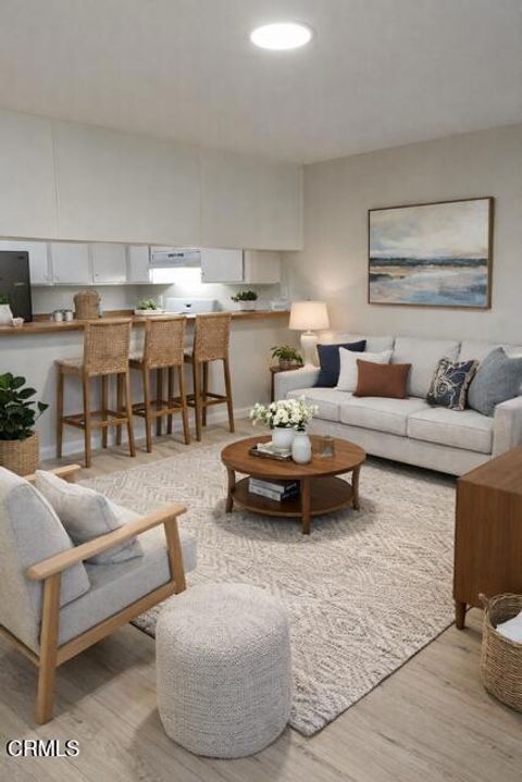 Photo of 1851 Patricia Avenue #104, Simi Valley, CA 93065 (MLS # V1-34578)