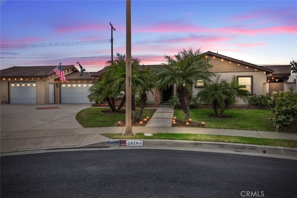 Welcome to your dream home, ideally situated on one of the largest lots in this desirable Orange County tract! Tucked away at the end of a quiet, family-friendly cul-de-sac, this spacious residence offers 2,000 square feet of thoughtfully designed living space on an impressive 8,856 square foot lot. With 3 generously sized bedrooms and 3 updated bathrooms, this home perfectly blends modern upgrades with timeless charm. Step inside to find an open-concept layout featuring a spacious and inviting living room centered around a striking wood-burning fireplace and a custom-built media center. The updated kitchen showcases custom wood cabinetry, granite countertops, and a built-in office nook, ideal for remote work or homework. The adjacent dining area exudes natural warmth and modern simplicity, ideal for entertaining guests and includes a convenient 3/4 bathroom. Flowing seamlessly from the living room, is a bright and airy enclosed sunroom offering a versatile extension of living space, and equipped with a wall-mounted mini split AC unit with washer/dryer hookups, for the perfect comfort and functionality. Retreat to the luxurious primary suite, which features a spacious walk-in closet, a cozy reading nook, and serene views of both the front and back yards. The attached two-car garage features custom cabinetry for optimal organization and also houses the soft water tank, while the gated RV parking adds a rare and valuable amenity. When stepping outside into your private backyard oasis, thoughtfully designed for both entertaining and everyday enjoyment, equipped with 2 covered patios, lush landscaping, café lighting, outdoor fans, built-in heating, manual roller shades, and a rejuvenating above-ground spa/jacuzzi makes this an ideal year-round setting for outdoor enjoyment.
ADDED BONUS: The property includes a fully upgraded 1 bedroom, 1 bathroom, private ADU that is perfect as a rental unit or guest quarters. This self-contained space features its own parking area, covered garage/storage, oversized storage shed, private laundry , a 2-burner electric cooktop, microwave, full-size refrigerator, and a remodeled kitchen with granite countertops, under-cabinet lighting, and recessed lighting throughout, and all within a spacious open-concept layout. Easy access to the 55,5,22,57 & 91 freeways, walking distance to shopping, dining, direct access to Santiago Creek biking/jogging trail, parks, Chapman University, and the Orange Circle.
