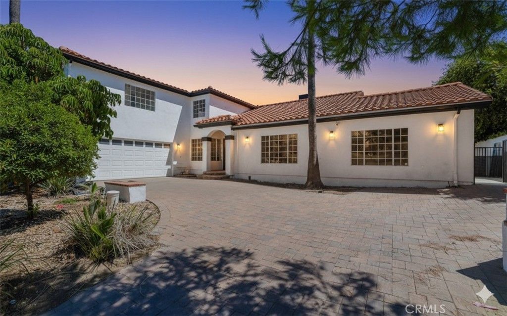 Photo of 4424 Deanwood Drive, Woodland Hills, CA 91364 (MLS # OC25094079)