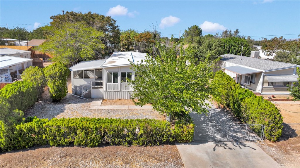 Welcome to this well-maintained 3-bedroom, 2-bath home featuring a cozy enclosed porch/patio, perfect for relaxing or entertaining year-round.
Set on just over 0.17 acres of owned land—with no HOA fees—this property offers both freedom and privacy, thanks to the lush hedges and mature trees that surround the perimeter.
Enjoy the convenience of a concrete driveway making parking a breeze for you, family, and guests alike.
Don't miss your chance to own a private retreat with room to grow and no added restrictions.
Schedule your showing today!
