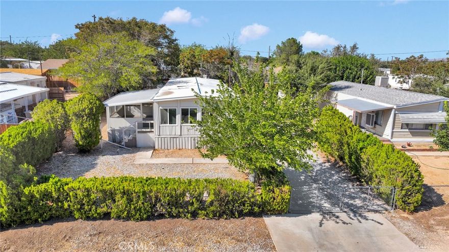 Welcome to this well-maintained 3-bedroom, 2-bath home featuring a cozy enclosed porch/patio, perfect for relaxing or entertaining year-round.



Set on just over 0.17 acres of owned land—with no HOA fees—this property offers both freedom and privacy, thanks to the lush hedges and mature trees that surround the perimeter.



Enjoy the convenience of a concrete driveway making parking a breeze for you, family, and guests alike.



Don't miss your chance to own a private retreat with room to grow and no added restrictions.



Schedule your showing today!