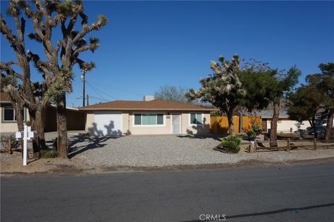 Photo of 7384 Elata Ave, Yucca Valley, CA 92284 (MLS # OC26071099)