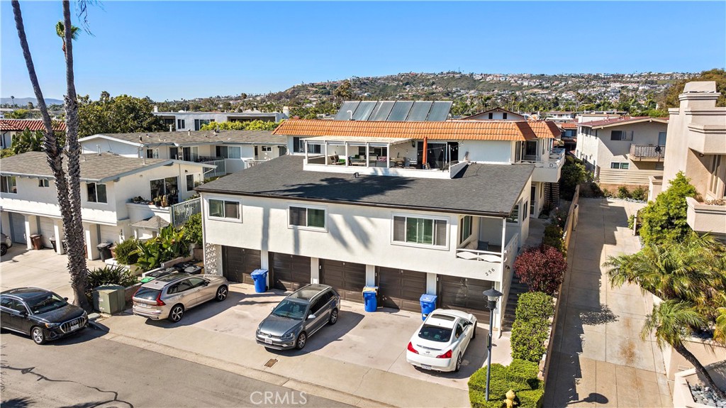 Ocean views and the ultimate coastal lifestyle from this incredible offering on the highly coveted “Loop” in southwest San Clemente—just steps from State Beach and direct access to the San Clemente Beach Trail! This rare property features five spacious 2-bedroom, 2-bath units, each approximately 1,250 sq ft. Many updates throughout the units including flooring, windows, appliances, and more. Each unit includes a 1-car garage and an additional driveway parking space. New exterior paint was recently completed. The property is located within one of the few designated areas in San Clemente zoned for Short-Term Lodging Units (STLUs), allowing for potential short-term rentals of less than 30 days with proper city permits (buyers to verify with the City of San Clemente). With its unbeatable location, ocean views, and income potential, this is an extraordinary investment opportunity and a unique find along the beautiful Southern California coast!