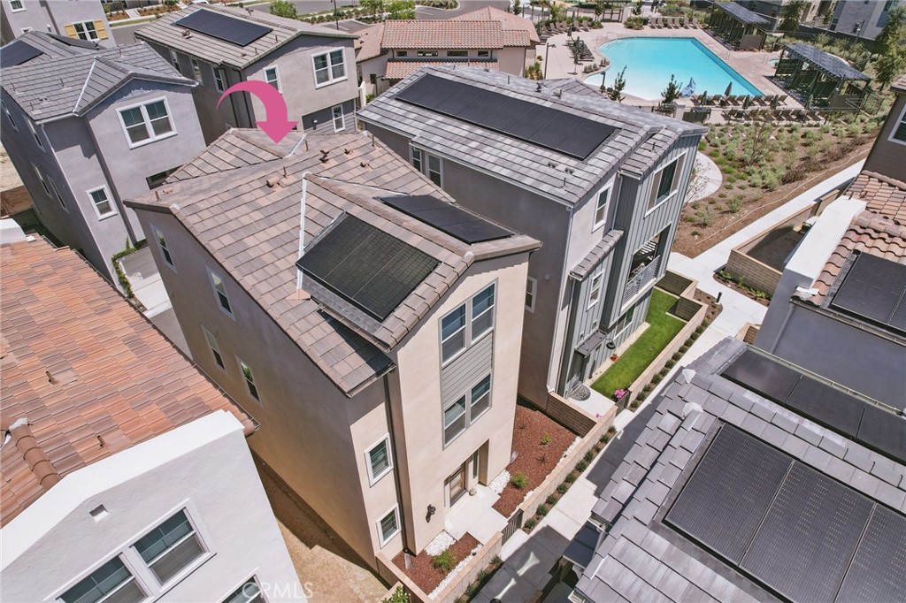 This beautiful DETACHED home in the Rienda Flora Collection of Rancho Mission Viejo offers a blend of modern living and resort-style amenities, all just steps from the pool and playground! The open-concept design includes 2 bedrooms, a versatile FLEX-ROOM, and 2.5 bathrooms. The kitchen features elegant quartz counters, a large island, stainless Samsung appliances, recessed lighting, and a walk-in pantry, all flowing into the living room and private balcony with views of the POOL and surrounding HILLS. The upper level houses both bedrooms, with the primary suite offering a luxurious bath with dual vanities, a walk-in shower, and a spacious walk-in closet. The second bedroom is complete with a full bath and a walk-in closet. The entry-level flex-room is ideal for a home office and offers access to a wrap-around ENCLOSED YARD through sliding glass doors. Other highlights include solar system, EV charger, Nest thermostat & Ring doorbell. Residents of Rancho Mission Viejo enjoy exceptional amenities including the vibrant Ranch Camp, the Rienda Plunge pool, resort-style pools and spas, a variety of FITNESS CENTERS, tennis and pickleball courts, bocce ball courts, playgrounds, and more. Plus, you'll have access to community farms, coffee shops, fire pits, an arcade, and the nearby Esencia K-8 school!