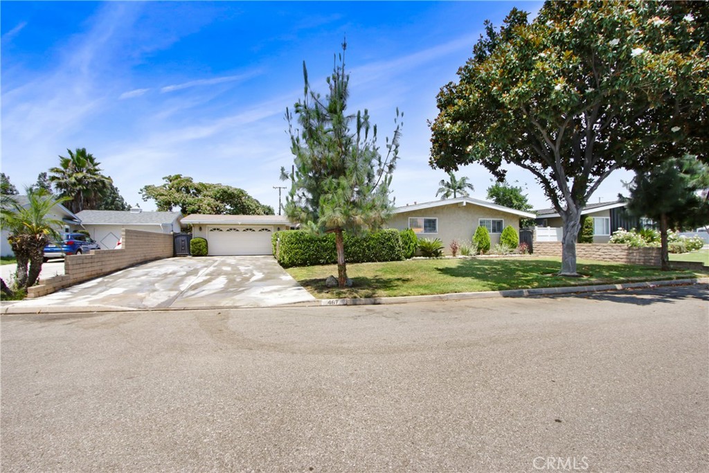 Welcome to your dream home nestled in one of Covina's most sought-after neighborhoods! This beautifully maintained 4-bedroom, 3-bath residence features a spacious bonus 5th room, ideal for a home office, guest suite, or playroom. Designed with comfort and functionality in mind, the home showcases tile flooring throughout, elegant recessed lighting, classic white shutters, and 1 stylish barn door. Enjoy cozy evenings by the gas fireplace, while the A/C system, double-paned windows, rain gutters, and metal security screen door offer modern convenience and peace of mind. The open floor plan creates a seamless flow between the living, dining, and kitchen areas perfect for entertaining and everyday living. Step into the fully paved backyard oasis complete with a fire pit, soothing fountain, and a built-in barbecue with an exterior cement island. Low-maintenance landscaping and a side area provide both beauty and ease. The private front courtyard features a gazebo and mosaic concrete patio table set, creating a peaceful retreat for you and your guests. The two-car garage is complemented by an extra-wide, extended driveway perfect for RV parking. Situated near Covina High School, Traweek Junior High School, and Workman Avenue Elementary School, this home is ideal for families seeking quality education options nearby. Located near major freeways (210, 10, and 57), top shopping destinations including Eastland shopping center, Plaza West Covina and The Lakes Mall, Beautiful downtown Covina with old town charm, new laugh factory, local parks like Walnut Creek, and just minutes from Via Verde Country Club for golf lovers—this home truly has it all. Don’t miss this rare opportunity to own a home that checks every box. Schedule your private tour today and make this Covina gem your forever home!
