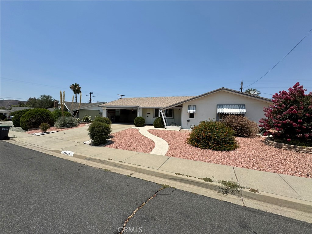 THIS HOME IS WAITING FOR SOMEONE TO COME MAKE IT THEIR OWN. TWO LARGE BEDROOMS AND 2 SPACIOUS BATHROOMS ALLOW PLENTY OF LIVING SPACE. WHEN YOU WALK IN THE FRONT DOOR YOU ARE MET WITH A ENORMOUS LIVING ROOM WITH BEAUTIFUL WINDOWS ALLOWING TONS OF NATURAL LIGHT IN. A SMALL DINING NOOK IS OFF THE KITCHEN FOR CASUAL DINING. A LARGE FAMILY ROOM WITH ANOTHER SET OF LARGE WINDOWS LET TONS OF NATURAL LIGHT IN. AN ENCLOSED LANAI ALLOWS YOU TO SEE THE WELL ESTABLISHED BACKYARD WITH ABSOLUTELY NO NEIGHBORS BEHIND YOU. WHAT WAS ONCE A GOLF COURSE NOW PROVIDES THE OPPORTUNITY OF NO NEIGHBORS IN THE BACK. THIS HOME NEEDS JUST A LITTLE ATTENTION FROM THE NEW OWNER TO BE THE PERFECT HOME.