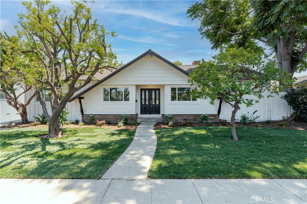 Beautifully renovated 4-bed + 2.5-bath home in Northridge. Brand-new luxury vinyl plank flooring flows through the 1,760 sq. ft. of living space. Front door leads to open-concept living and dining area, highlighted by a charming brick fireplace. The kitchen features brand new cabinetry, quartz countertops, stainless steel appliances, a stylish tile backsplash and ample prep space with easy access to the covered outdoor patio for indoor-outdoor entertaining. A separate laundry room connects to a convenient half bath and one of the bedrooms, allowing two bedrooms to enjoy ensuite access. All bathrooms have been updated with quartz countertop vanities. The detached garage offers excellent ADU potential. Nearby attractions include Northridge Fashion Center, The Soraya Performing Arts Center, and Dearborn Park. Just a short drive away, you’ll find the Japanese Garden, Lake Balboa Park, and the vibrant dining and shopping of Ventura Boulevard. Probate Sale. Court Confirmation NOT Required. Some of the photos have been virtually staged.